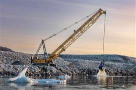 Munck Civil Engineering is using a Liebherr HS8200 duty cycle crawler crane to dredge the seabed in Ilulissat, Greenland, ahead of the construction of a new airport