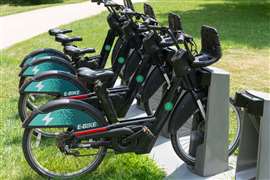 Electric bikes parked at a sharing station in Toronto, Canada.