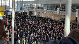 Crowds wait to enter Bauma 2025 on the exhibition's first day.