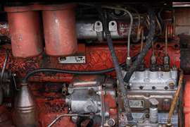 An old diesel engine in a tractor.