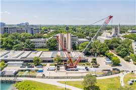 red and white Liebherr LR 1300 crawler crane at work