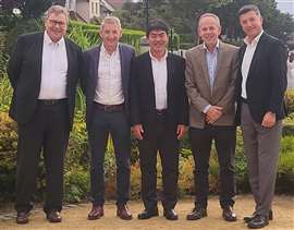 Members of the McHale and Komatsu teams at signing of purchase agreement.