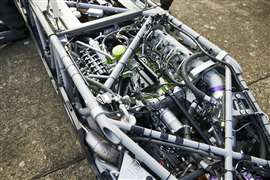 The twin hydrogen engines inside the Hydromax car during testing at RAF Wittering in June 2026 (Image: JCB)