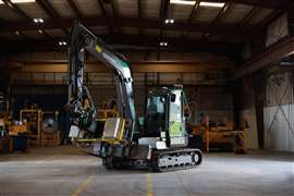 The X1 Panel Lift system can transport PV panel boxes, pick panels directly from them, and lift and place panels using a single excavator