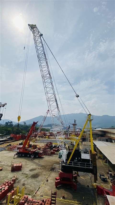 Yellow, white, black red upper section, no tower, on test in yard