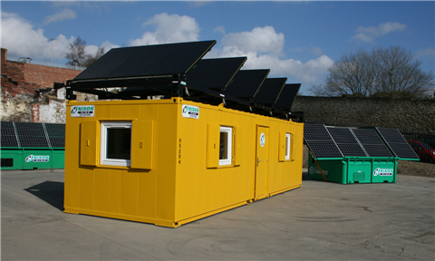 Rental cabins and toilet blocks with solar panels mounted on the roofs